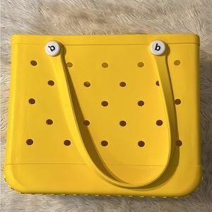 yellow BOGG bag